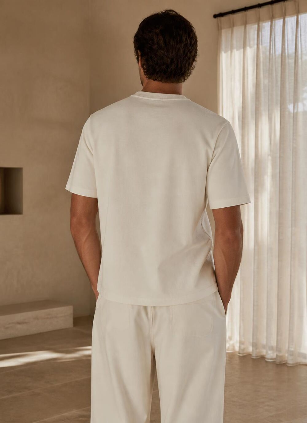 The Atlas Cotton Tee in White — Back — clean plain panel, straight hem thumbnail