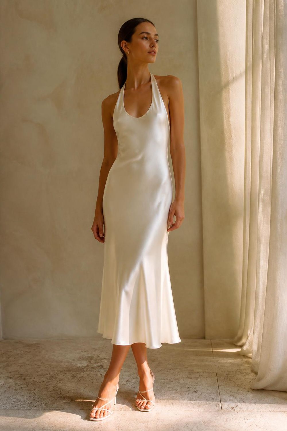 The Solène Open-Back Midi in Ivory — washable mulberry silk dress by Scarlett Adele, photographed in warm Australian and Los Angeles light.